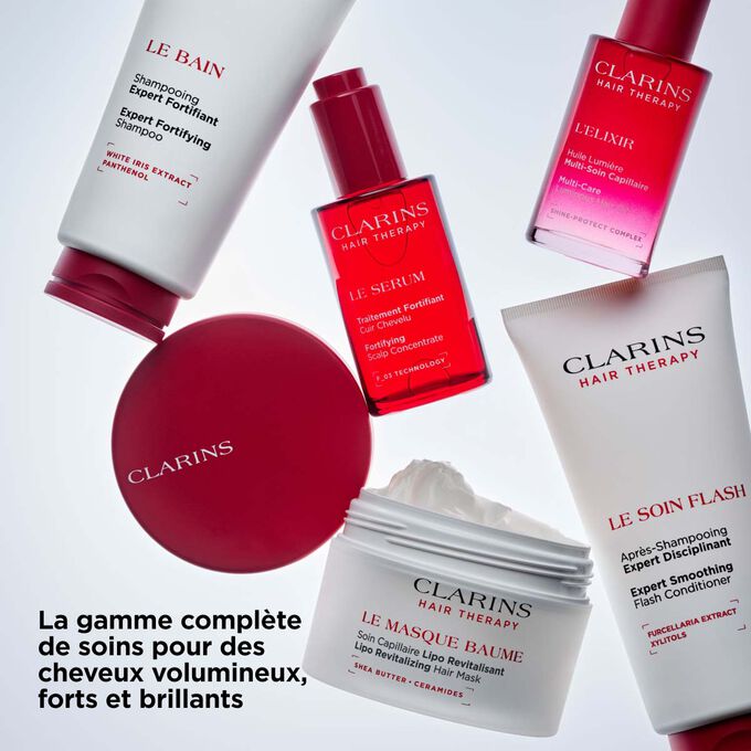 Gamme compl&egrave;te Clarins Hair Therapy : cinq soins cuir chevelu et cheveux pour booster le volume, la force et la brillance.