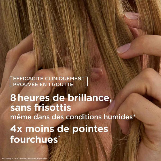 Huile capillaire anti-frisottis pour huit heures de brillance et quatre fois moins de pointes fourchues, m&ecirc;me dans des conditions humides.